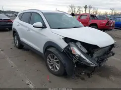KM8J3CA49GU164943 2016 HYUNDAI TUCSON