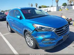 KM8J3CA49GU224526 2016 HYUNDAI TUCSON