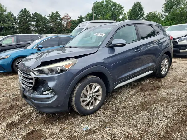 KM8J3CA49HU421181 2017 HYUNDAI TUCSON - Image 1