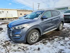 KM8J3CA49HU585868 2017 HYUNDAI TUCSON
