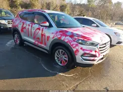 KM8J3CA49JU695874 2018 HYUNDAI TUCSON