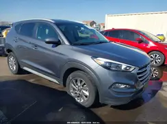 KM8J3CA49JU744135 2018 HYUNDAI TUCSON