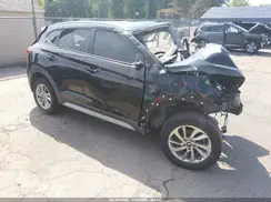 KM8J3CA49JU771240 2018 HYUNDAI TUCSON