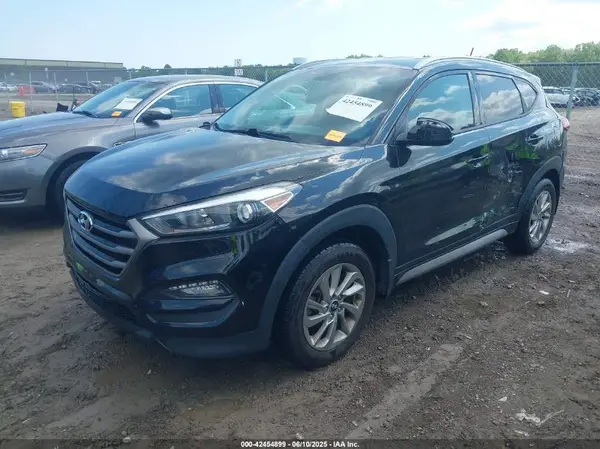 KM8J3CA4XGU074927 2016 HYUNDAI TUCSON - Image 2