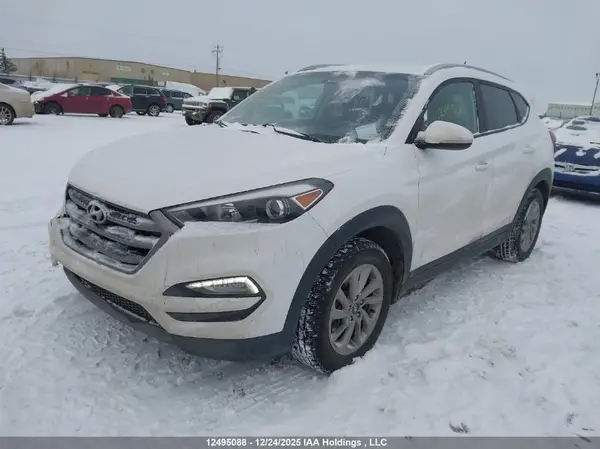 KM8J3CA4XGU091954 2016 HYUNDAI TUCSON - Image 2