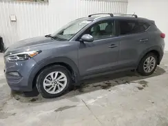 KM8J3CA4XGU109661 2016 HYUNDAI TUCSON