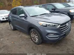 KM8J3CA4XGU181833 2016 HYUNDAI TUCSON