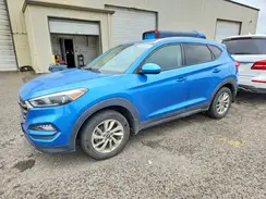 KM8J3CA4XGU228648 2016 HYUNDAI TUCSON
