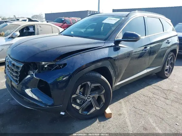 KM8JECD12RU237424 2024 HYUNDAI TUCSON - Image 2