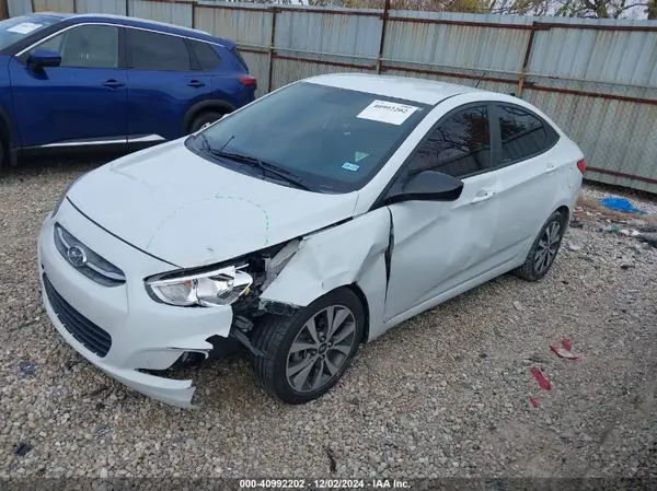 KMHCT4AE7HU371257 2017 HYUNDAI ACCENT - Image 2