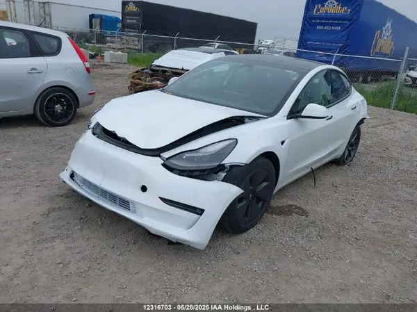 LRW3E1FA9PC876303 2023 TESLA MODEL 3 - Image 2