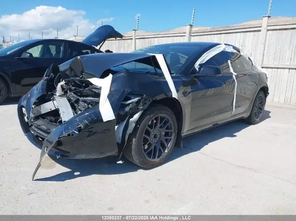 LRW3E7FA0RC099435 2024 TESLA MODEL 3 - Image 2
