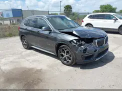 WBXHT3C31GP884133 2016 BMW X1