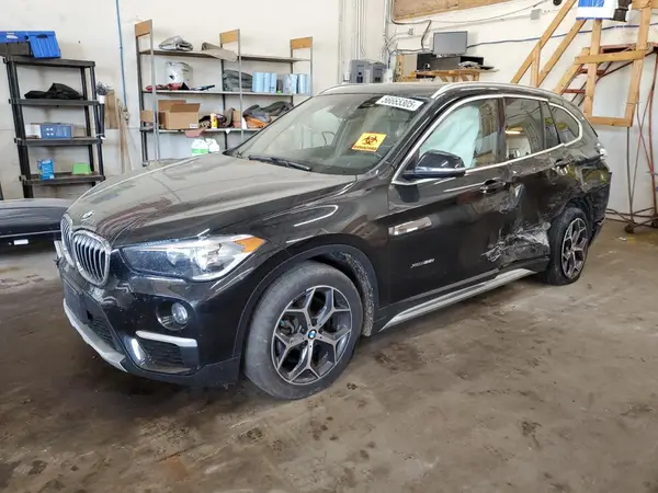 WBXHT3C31J5L24230 2018 BMW X1 - Image 1