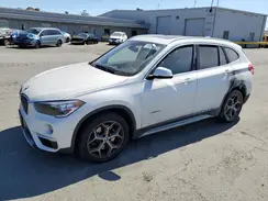 WBXHT3C37J5F90497 2018 BMW X1