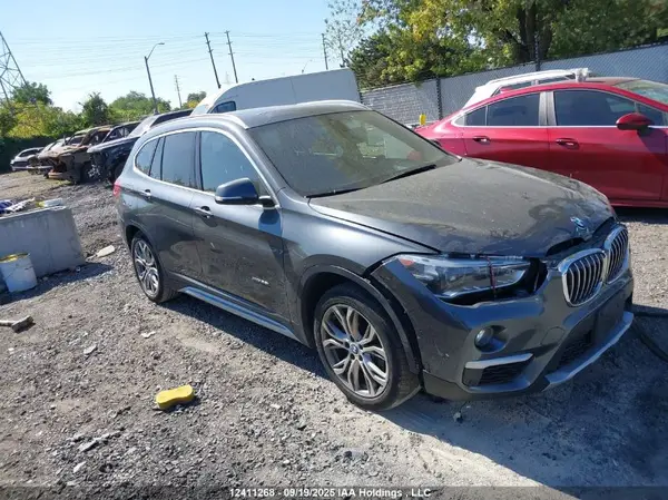 WBXHT3C39G5E56566 2016 BMW X1 - Image 1