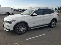 WBXHT3C39GP889323 2016 BMW X1