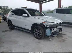 WBXHT3Z32J4A66915 2018 BMW X1