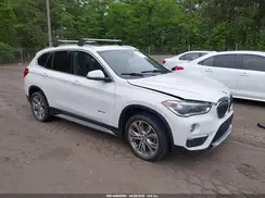 WBXHT3Z34H4A56042 2017 BMW X1
