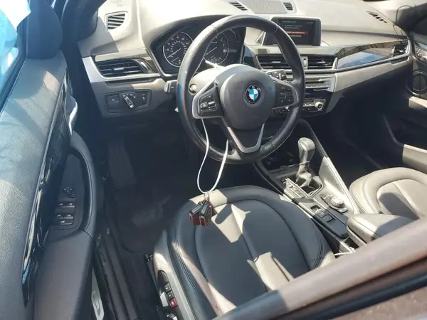 WBXHU7C30J5H44634 2018 BMW X1 - Image 8