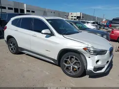 WBXHU7C30J5L04927 2018 BMW X1
