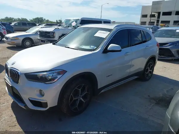 WBXHU7C30J5L04927 2018 BMW X1 - Image 2