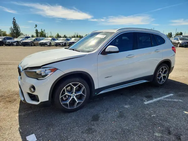 WBXHU7C31J5H39104 2018 BMW X1 - Image 1