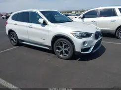 WBXHU7C32J5H42058 2018 BMW X1