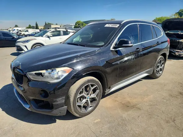 WBXHU7C32J5L06517 2018 BMW X1 - Image 1