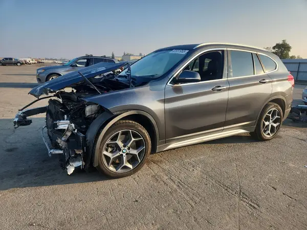 WBXHU7C36J3H43810 2018 BMW X1 - Image 1