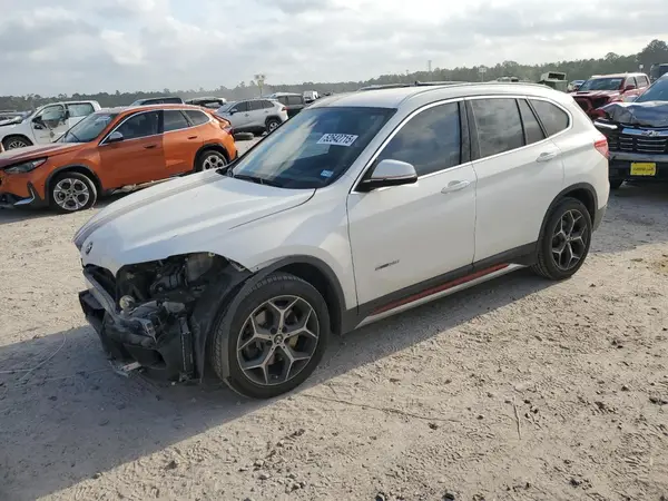 WBXHU7C36J5H40278 2018 BMW X1 - Image 1