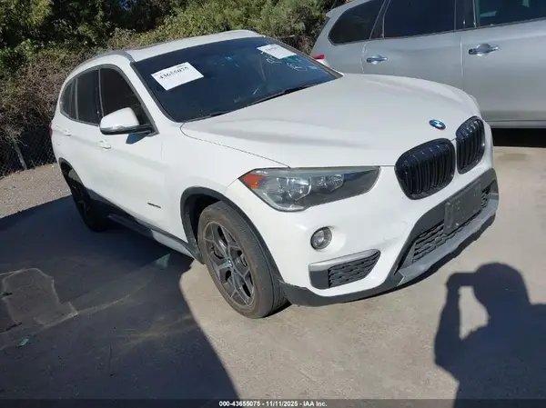 WBXHU7C37J5H42458 2018 BMW X1