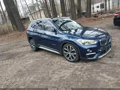 WBXHU7C38H5H37148 2017 BMW X1