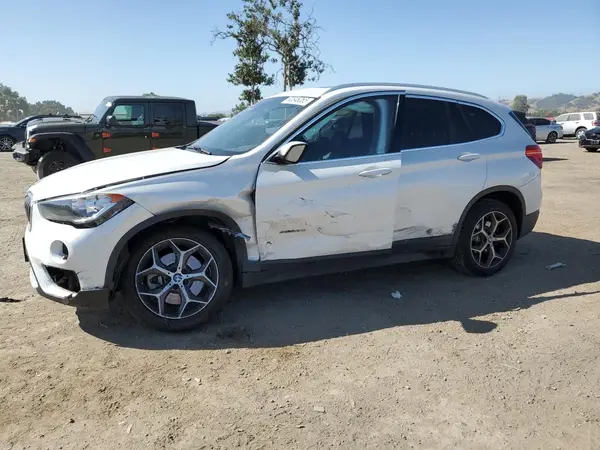 WBXHU7C38J5L05663 2018 BMW X1 - Image 1