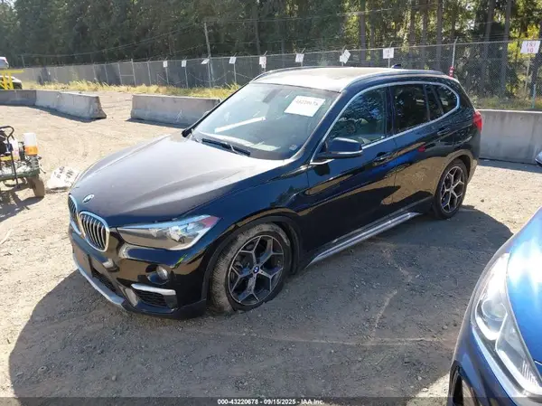 WBXHU7C38J5L09762 2018 BMW X1 - Image 2