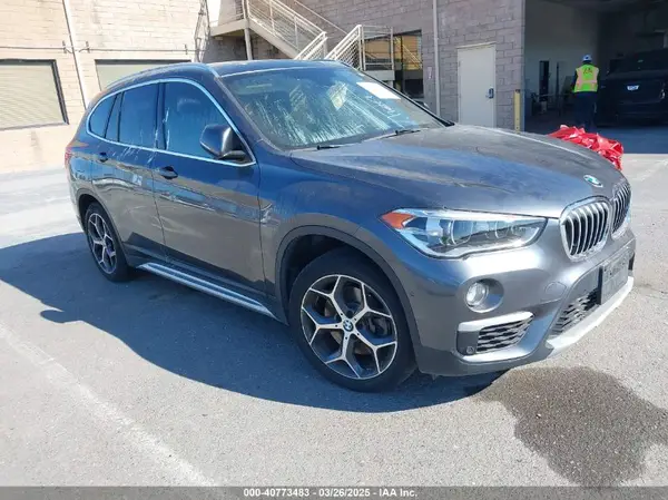 WBXHU7C39J3F04543 2018 BMW X1 - Image 1
