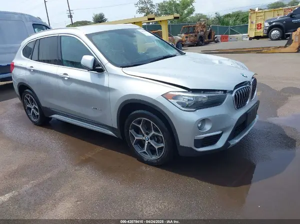 WBXHU7C39J5L04845 2018 BMW X1 - Image 1