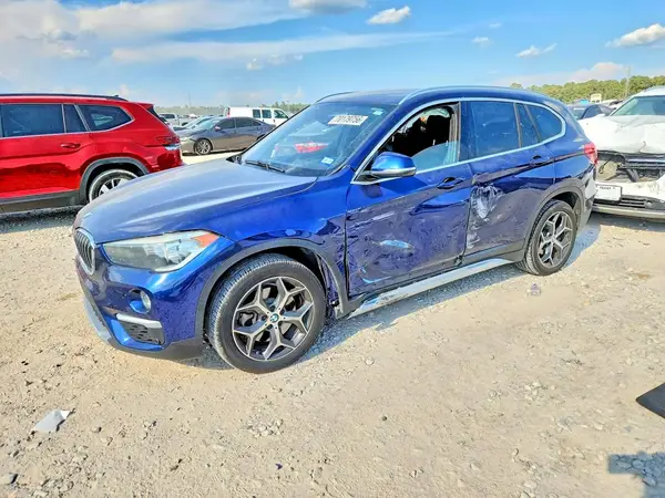 WBXHU7C39J5L05719 2018 BMW X1 - Image 1