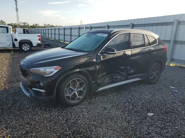 WBXHU7C39J5L09057 2018 BMW X1 - Image 1