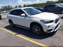 WBXHU7C3XJ5H42521 2018 BMW X1