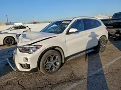 WBXHU7C3XJ5L08080 2018 BMW X1